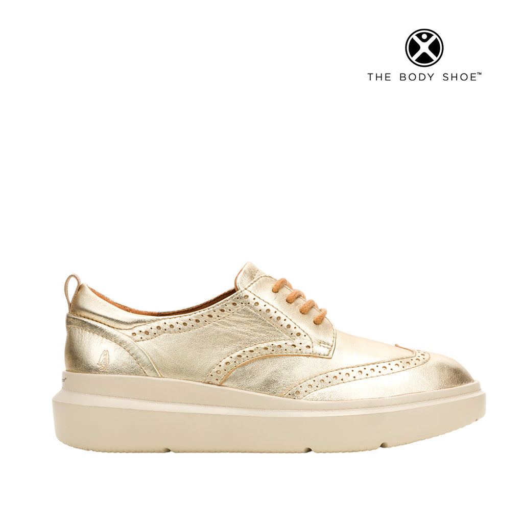 Tennis Joy para mujer color dorado