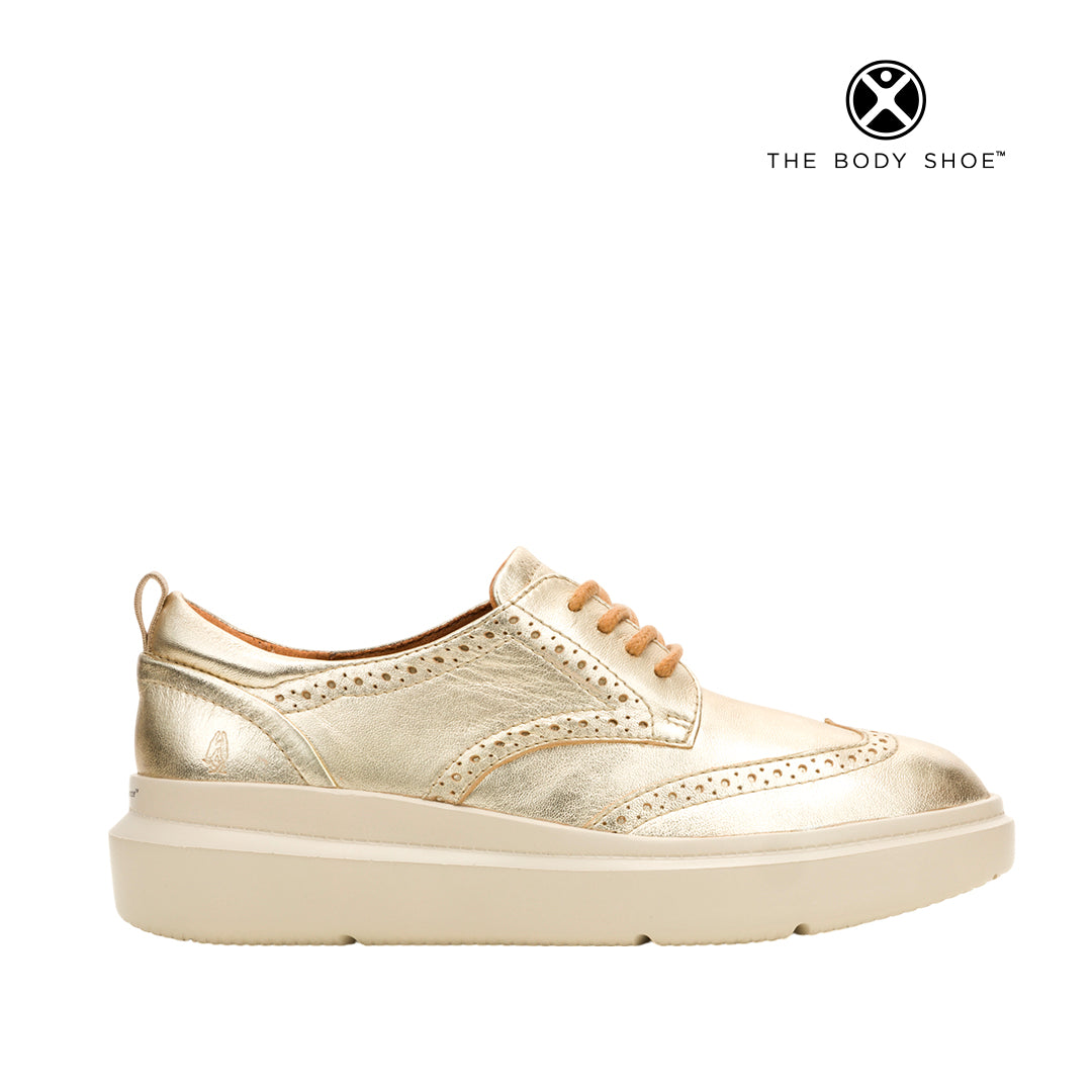 Tennis Joy para mujer color dorado